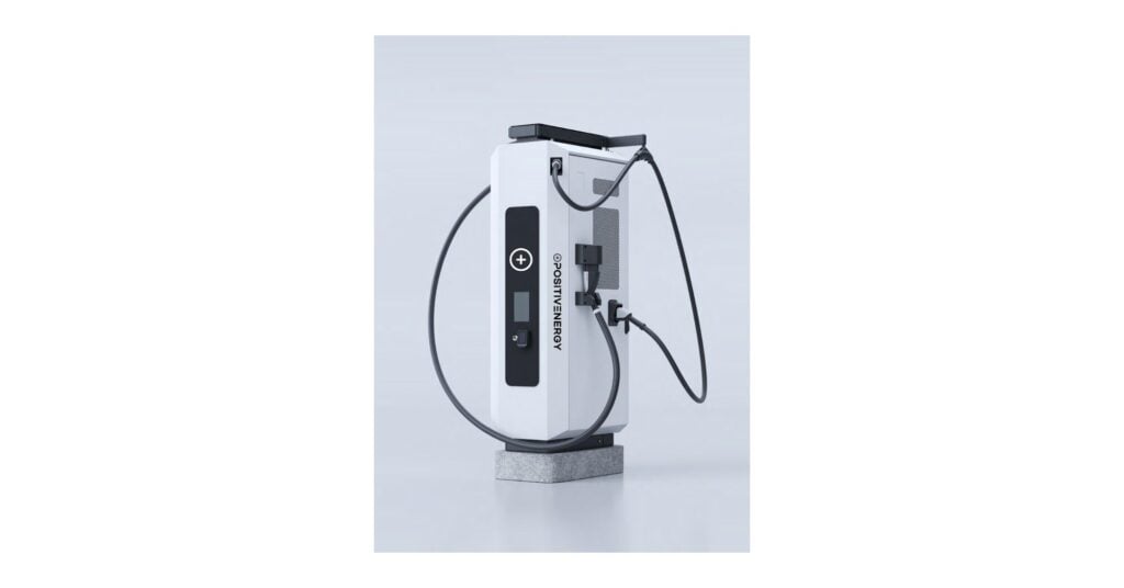 White electric vehicle charging station with cord and display panel mounted on gray base