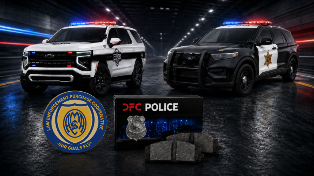 Two police SUVs with emergency lights, DFC Police sign, and law enforcement agency seal on wet pavement