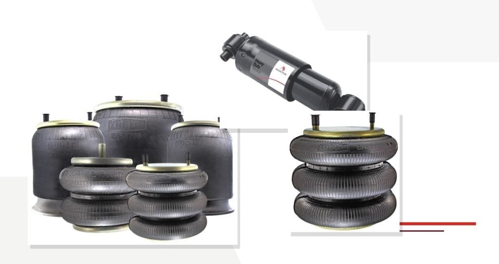 Heavy-duty truck air springs in several sizes shown with a Meritor heavy duty shock absorber
