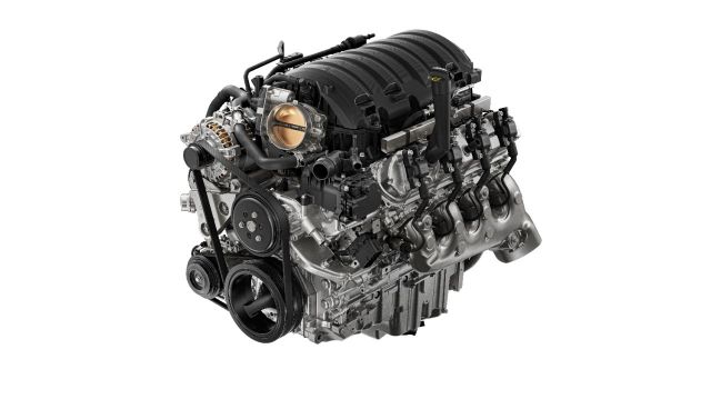 V6 engine with intake manifold and accessory components, front three-quarter view