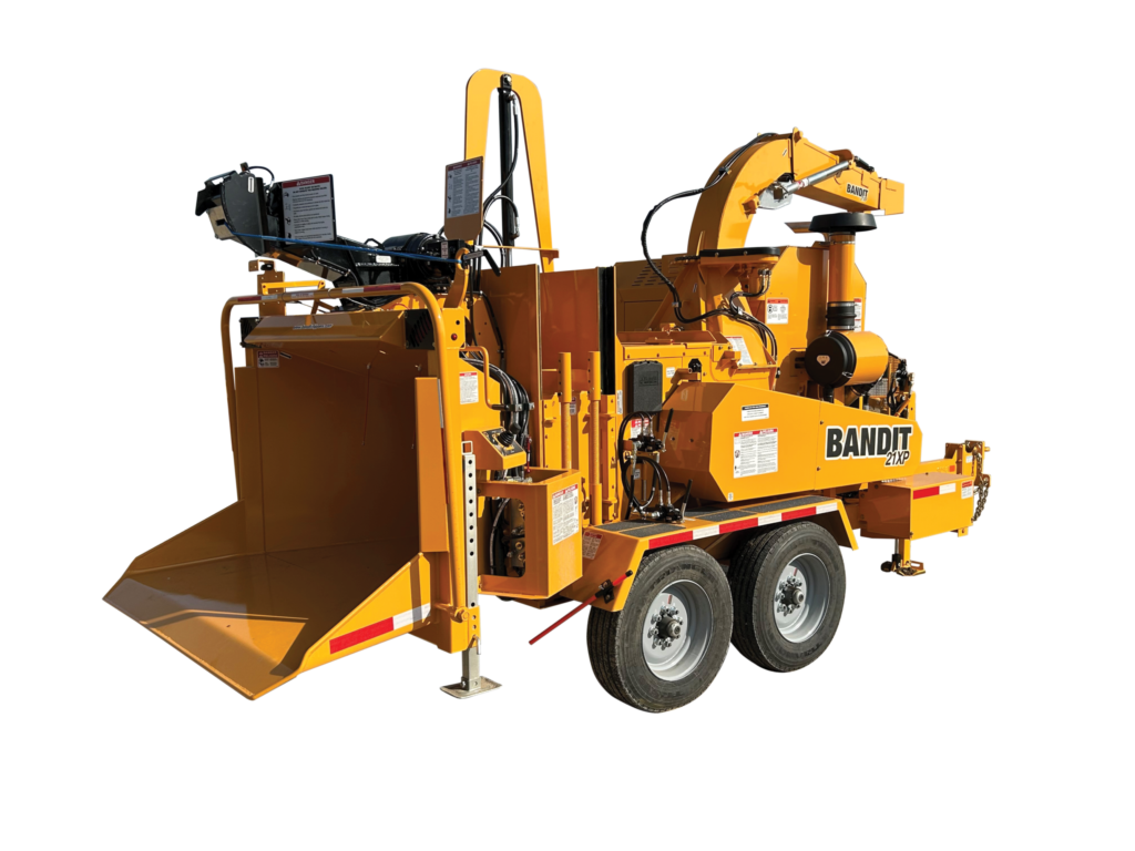 Yellow and brown Bandit wood chipping trailer with dual axles and hydraulic feed system