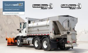Combination truck with snow plow blade and salt spreader attachment, Sourcewell contract badge visible
