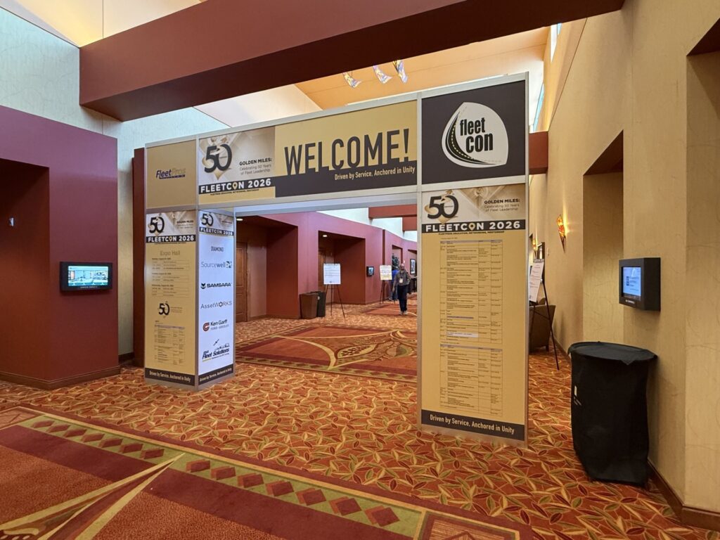 FleetCon 2026 conference entrance with welcome signage and exhibit hall doorway