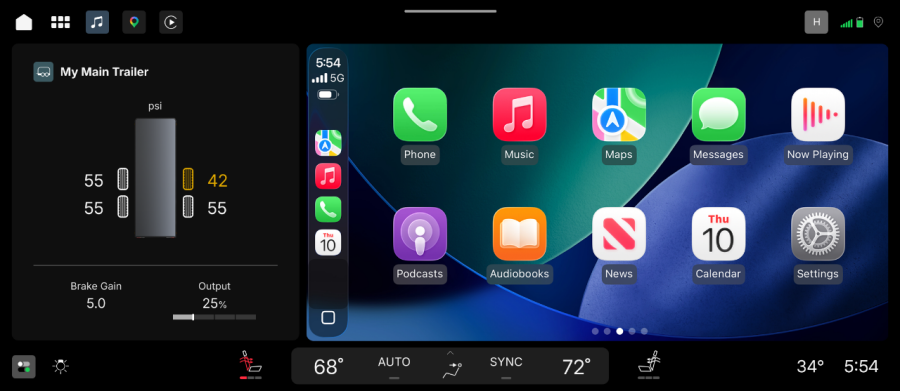 Screenshot of Apple CarPlay interface displaying phone, music, maps, messages, and other apps on vehicle dashboard screen