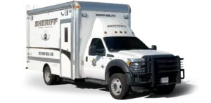 White and silver sheriff bomb squad vehicle with black grille and protective cage