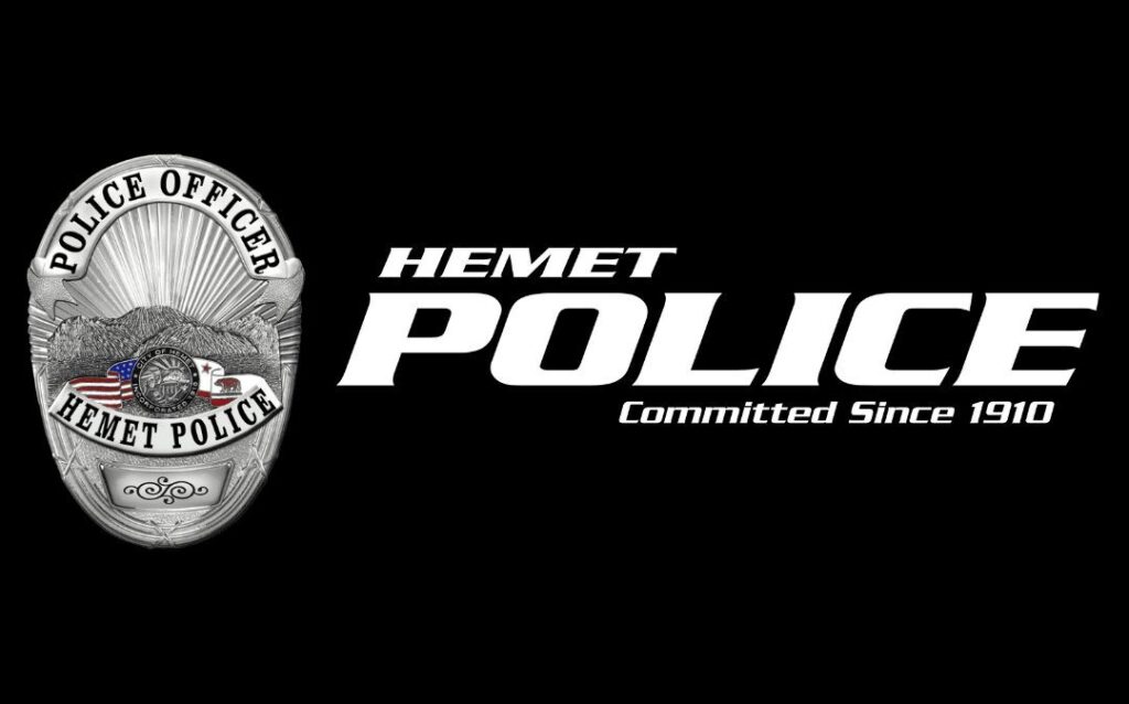 Hemet Police Department badge and wordmark logo on black background