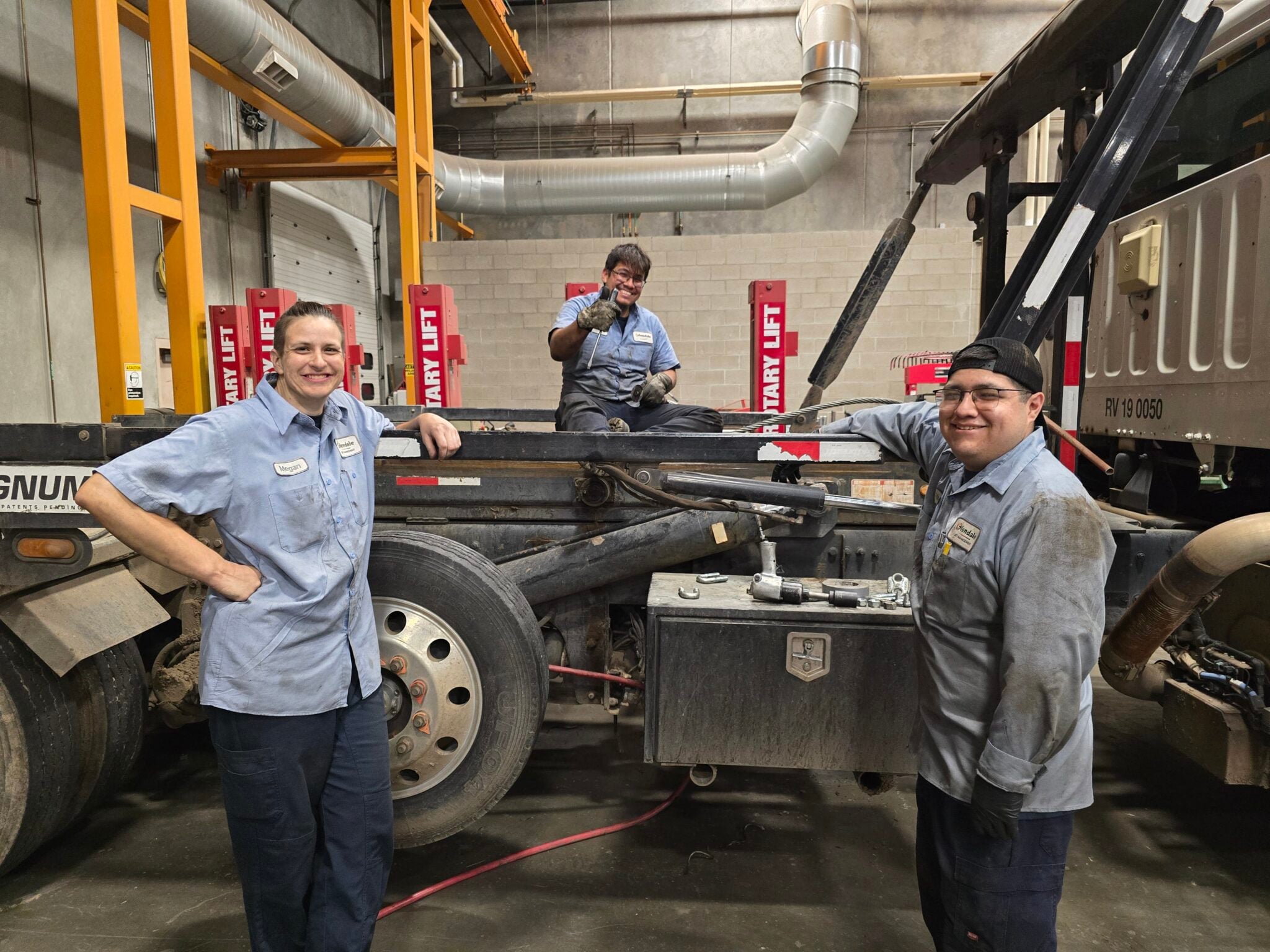 Flagstaff's first three tech school employees are still working at the city fleet. Pictured left to right are Megan Krahulec, fleet mechanic light duty; Emiliano Reyes, fleet mechanic heavy duty; and Alberto Remirez, fleet mechanic heavy duty.
