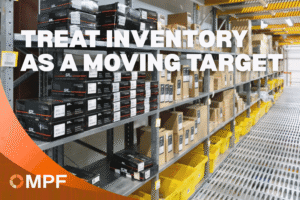 Warehouse shelving stocked with boxed inventory and yellow storage bins, with MPF logo