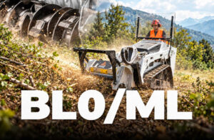 White mini track loader with mulching attachment clearing vegetation on mountainous terrain
