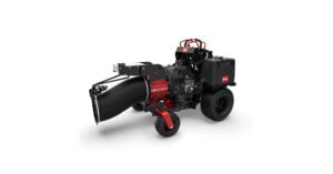 Toro stand-on blower with red and black frame and large cylindrical debris collection drum