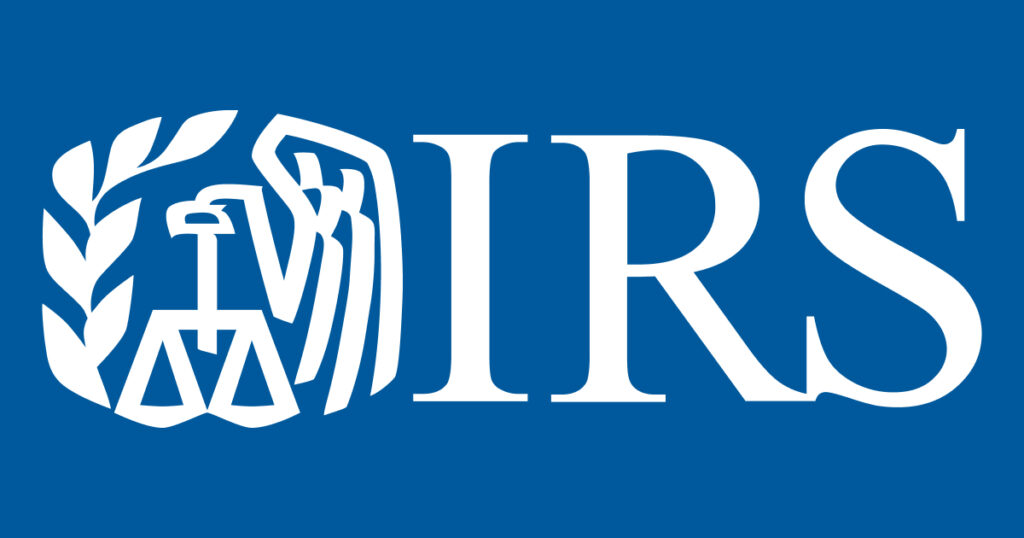 IRS logo on blue background with eagle, scales, and laurel wreath