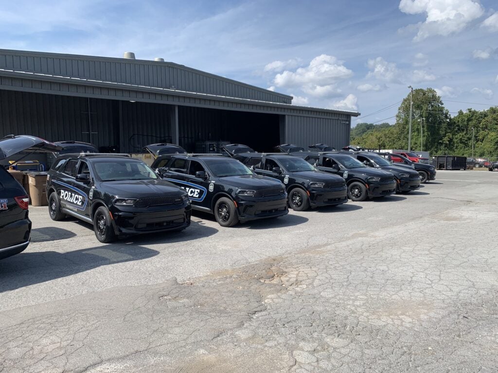 A row of Knoxville Police Dodge Durango patrol vehicles