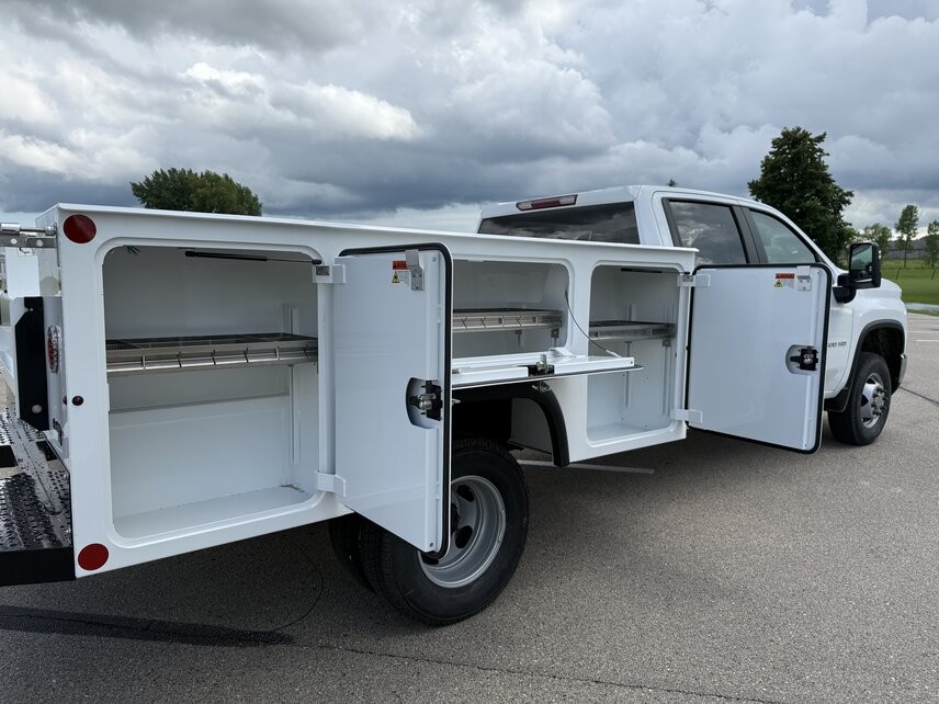 Monroe ServicePRO XP S-Series aluminum service body with compartment doors open on a pickup chassis