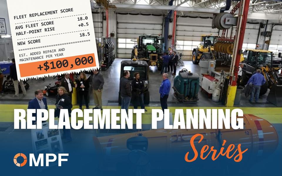 Warehouse facility with heavy equipment and attendees viewing fleet replacement score analysis chart showing maintenance cost data